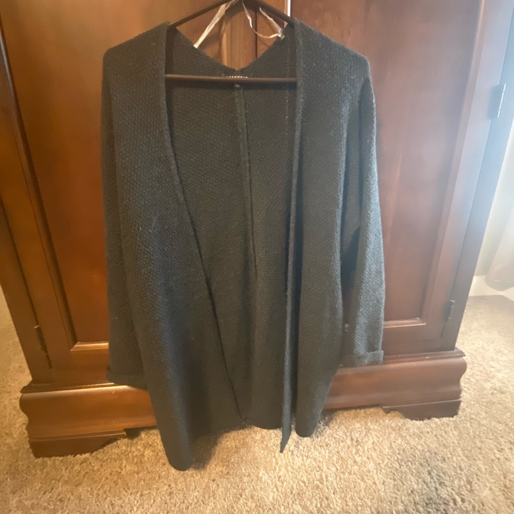 Women’s cardigans. $15 each